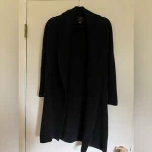 100% black ribbed cashmere shawl cardigan from Halogen. Quiet luxury and cozy.